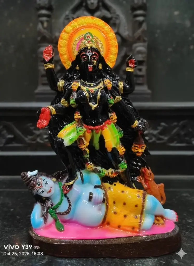 Goddess Kali standing over Lord Shiva idol